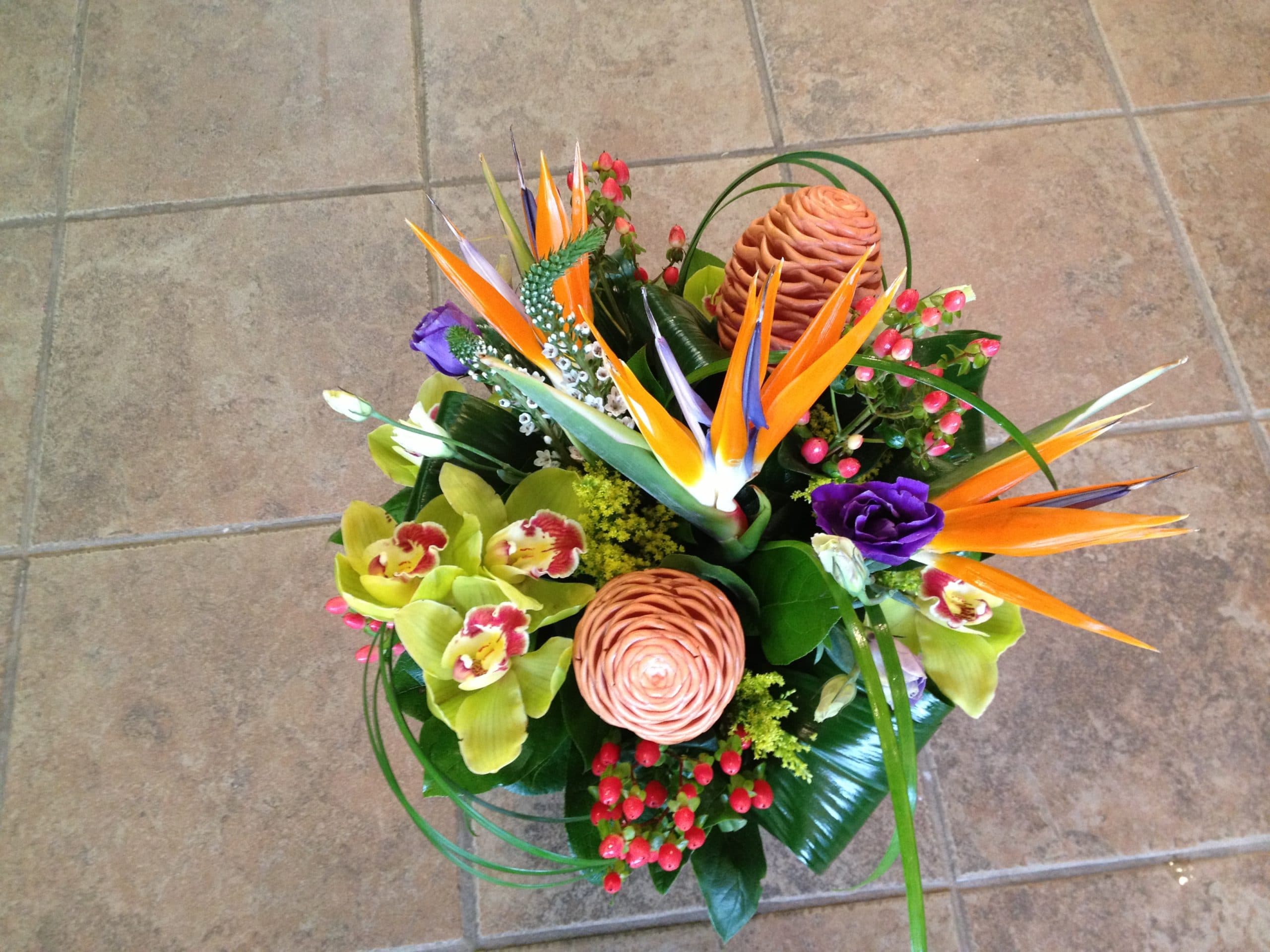 Jungle Whirl tropical arrangement with heliconia