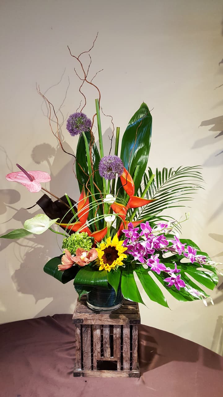 Tropic Thunder bold tropical arrangement with pink ginger and anthurium