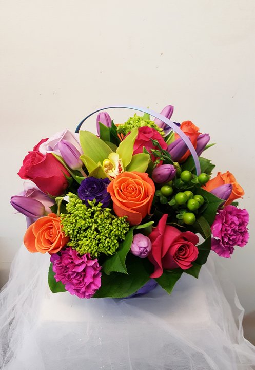 Luz del Caribe tropical arrangement in bright Caribbean tones